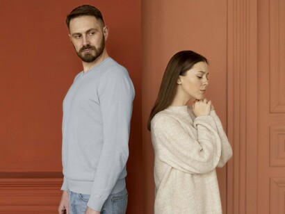 A tense moment between partners after a disagreement, representing the importance of healthy emotional boundaries