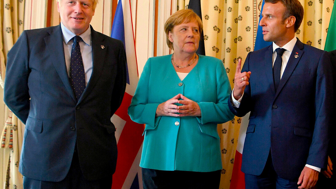 Boris Johnson, Angela Merkel y Emmanuel Macron