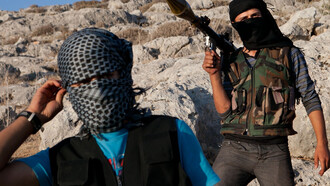 Combatientes en la frontera entre Siria e Irak