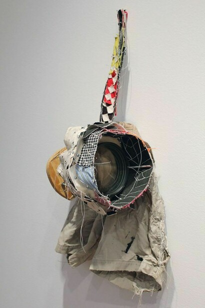 Greg Smith, Military Lense Camera, 2013, Canvas, fabric, thread, shorts, graphite, reconnaissance, camera lens, digital camera parts, wood, hardware. Courtesy: Susan Inglett Gallery, NYC.
