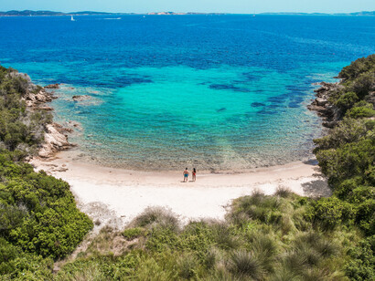 Elevate your vacation experience with a mesmerizing bird's eye view of Sardinia's pristine shores, exclusively at Delphina Hotels, Italy
