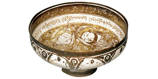 Drinking Bowl used for Wine, depicting a Couple, Unknown early 13th century Kashan/Iran fritware with tin glaze and lustre paint H 10,9 cm; Ø 20,5 cm
