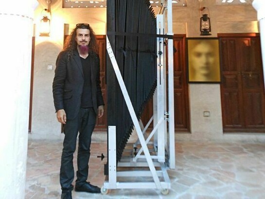 Artist Halim Al Karim with his custom camera. Courtesy of the artist and Robischon Gallery.