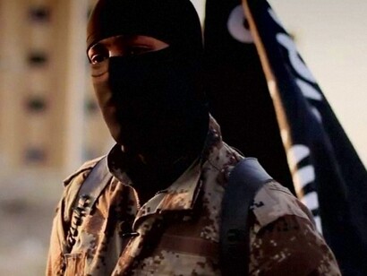 Miembro encapuchado del estado islámico