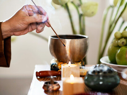 A therapist using acupuncture to stimulate energy channels, promoting healing and balancing the body's stress response
