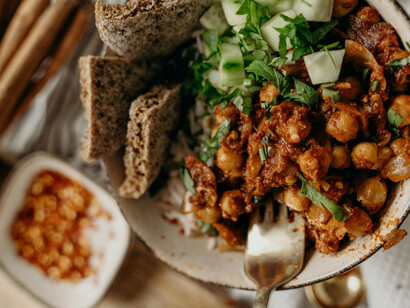 Colorful balanced diet bowl with chickpeas and fresh vegetables in natural light