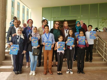 A group of delegates engaging in discussions at the 2019 Intercultural Dialogue for Sustainable Development event in Cairo, Egypt