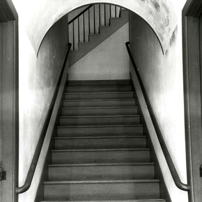 Interior of Meetinghouse, detail of stairway to Ministry’s living quarters, showing doors to brethren’s and sisters’ shoe or cloak rooms on either side (Church Family, Mount Lebanon, New York)
