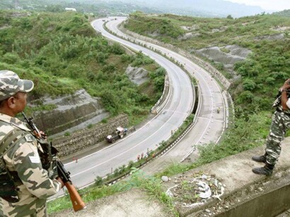 India’s security forces patrol the Jammu-Srinagar highway