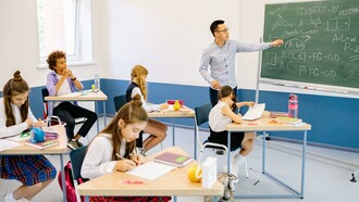 Teacher and students in a classroom; learning time