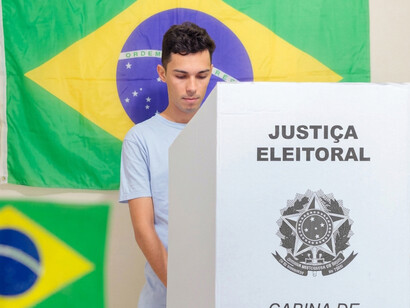A Brazilian voter participates in the national elections at a local polling station
