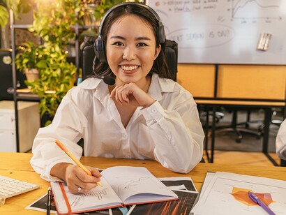 Woman smiling and succeeding at work