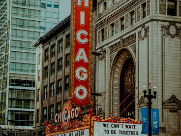 The iconic Chicago Theatre glowing in the downtown evening, Chicago, Illinois, United States