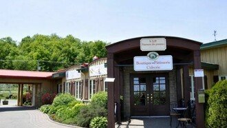 Ingreso a la huerta Vergers Lafrance