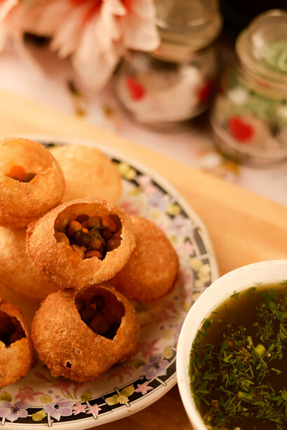 Gol gappa, India’s beloved street snack, elevated to a fine dining experience with refined plating on ceramic
