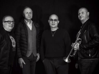 Collina, Marchesini, Di Piazza, Vezzoso. Abbiamo molta curiosità che ci spinge sempre ad andare al di fuori dei nostri confini, non solo geografici ma anche di mentalità e anche il piacere di condividere linguaggi, esperienze con musicisti stranieri e quindi cercare di sviluppare al massimo un'apertura mentale