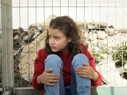 A young girl imprisoned in the film 'The Present'