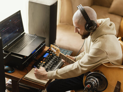 An innovative sound artist blending textures and tones to create unique musical landscapes