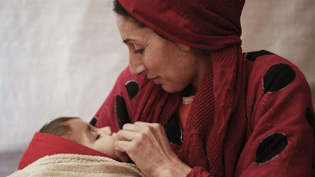 Madre siria con su hijo