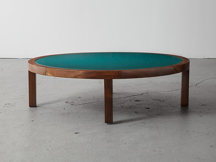 Joaquim Tenreiro, Round coffee table in jacaranda with a green glass top. Custom made for an estate in Sao Paulo, Brazil. Acquired from the original owner. Designed by Joaquim Tenreiro (1906-1992), Brazil, 1969. 11.5" H x 39" D. Photo: Sherry Griffin © Joaquim Tenreiro. Courtesy: Sean Kelly, New York with R & Company, New York