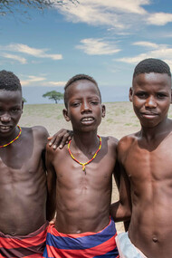 The serious expressions of the Kisii children offers a glimpse into the introspective nature of the youth, shaped by their unique cultural experiences