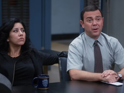 A casual workplace interaction between Rosa and Boyle in Brooklyn Nine-Nine, reflecting familiarity that makes comfort shows emotionally grounding