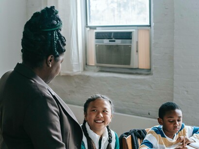 Teacher engaging students in Swahili class