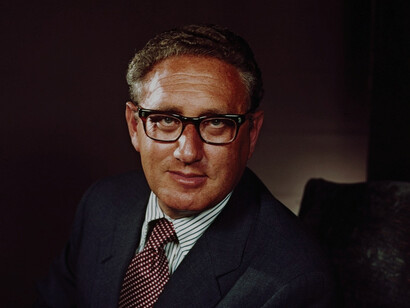 Henry Kissinger, born in Germany in 1923, fled to the United States during World War II, where he would eventually become a pivotal figure in shaping U.S. foreign policy during the Cold War