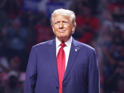 With a gaze that seems to pierce through his supporters, Trump’s expression betrays a dark, manipulative agenda, one that could plunge the nation into deeper turmoil