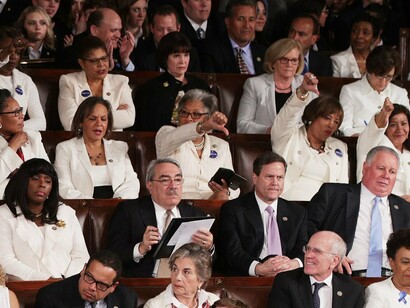 The Democratic women of Congress wearing white