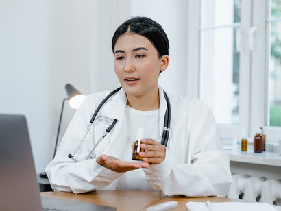 Utilizing telemedicine, doctors conduct virtual consultations through computers, performing thorough examinations and providing quality healthcare to patients from the convenience of their digital interface