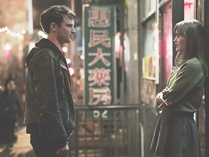 Tom Sturridge and Ella Purnell in the TV series “Sweetbitter” flirting with each other on the street