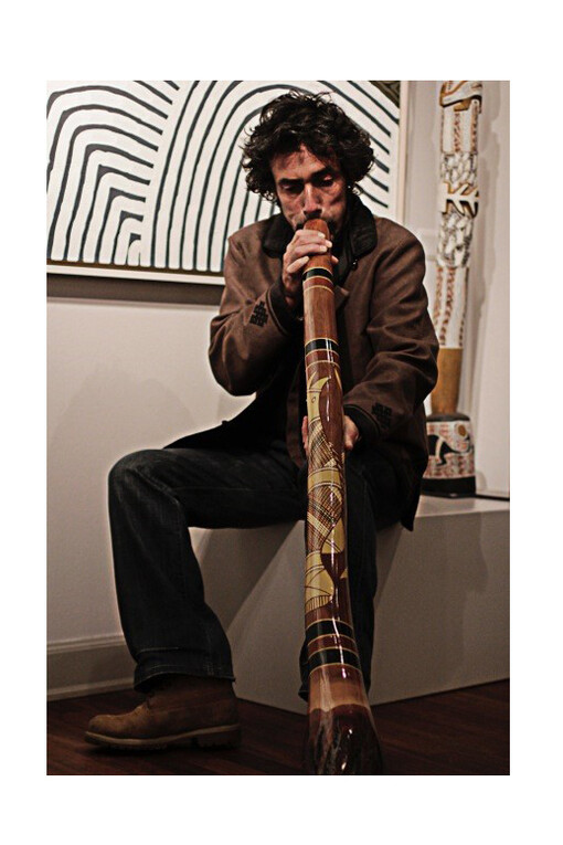 Anthropologist Nicola Pagano playing his Digeridoo (Nicola will be hosting an evening lecture and performance on the 19th May at the gallery to raise funds for the Indigenous Literacy Foundation - enquire with the gallery for tickets)