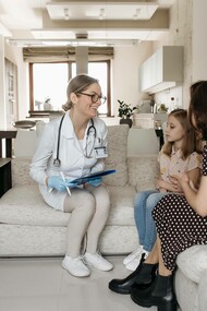 Mother takes child to the doctor