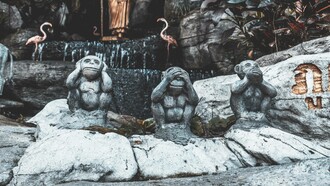 Three wise monkies in Golden Mountain Temple, Bangkok, Thailand