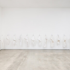 Kendell Carter, Cranes for Solange, 2017, Shelving brackets, denim jeans, locks, lightbox, found ephemera. Courtesy of Edward Cella Art & Architecture 