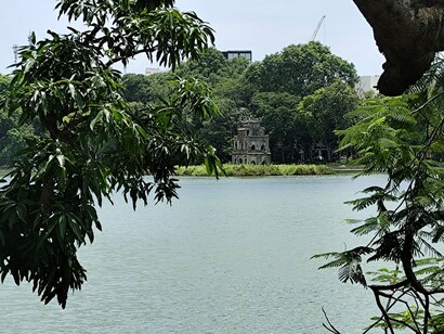 Turtle Tower rises quietly at the heart of Hoàn Kiếm Lake, keeper of Hanoi’s most enduring legend © Photo by Daniel Gauss