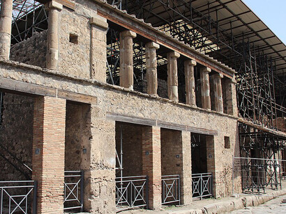 The Casa del Cenacolo Colonnato in Pompeii undergoes archaeological excavation and conservation efforts