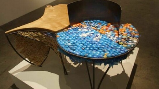Ifeoma Anyaeji, Oche Blue (Blue Chair), 2011, metal, discarded plastic bags and plastic electric wire rim, and wood, 42x36x27 inches