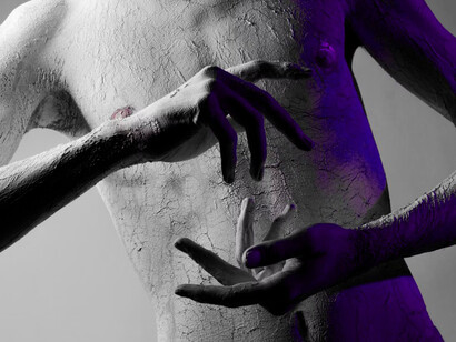 Art becomes the catalyst of transformation, as white powder clings to the body like a symbol of renewal