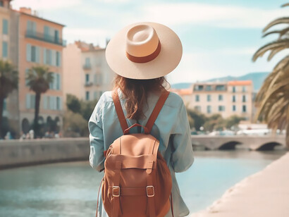A journey with a stylishly adorned girl, backpack in tow and hat on head, as she immerses herself in captivating travel destinations and enriching cultural experiences