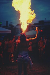 Tricks being displayed at a carnival, representing the social dilemma of pomp and facades