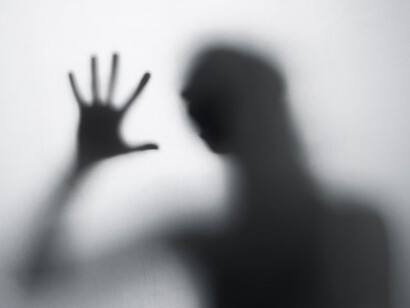 A shadow representing how suffering in silence is painful and echoes deeply in our emotional being 