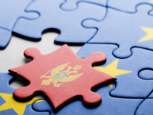 Montenegro fits its puzzle piece into the EU, representing its candidacy and the ongoing expansion of the European Union