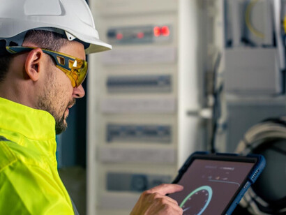  A technician monitors real time system data through an IoT enabled tablet 