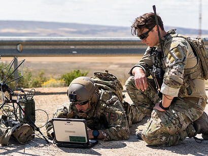 Airmen from the 93d Air Ground Operations Wing install command and control communication systems as part of Defender Europe 2023, held in Zaragoza, Spain, on May 16, 2023. The exercise enhances joint readiness and coordination among allied forces in Europe