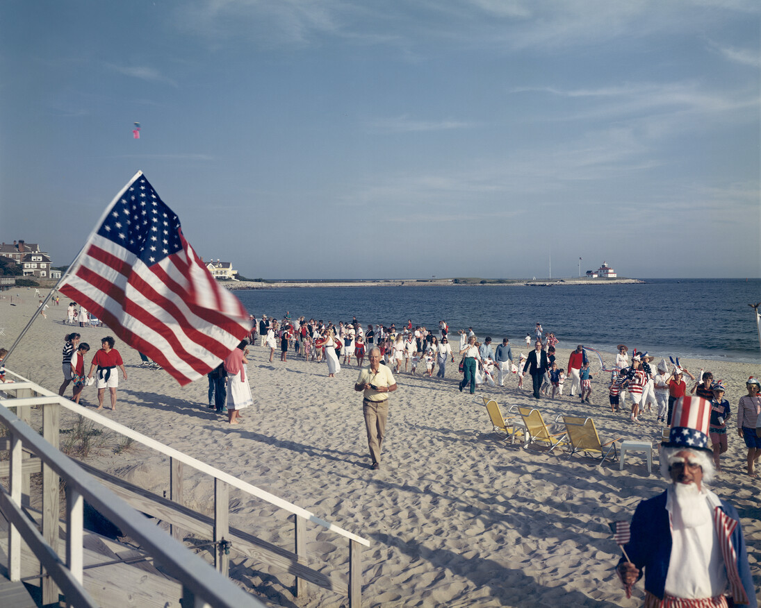 Tina Barney, 4th of July on Beach, 1989, chromogenic color print, 30 x 40 inches, 76.2 x 101.6 cm. Edition of 5 (#1/5)© Tina Barney. Courtesy Paul Kasmin Gallery
