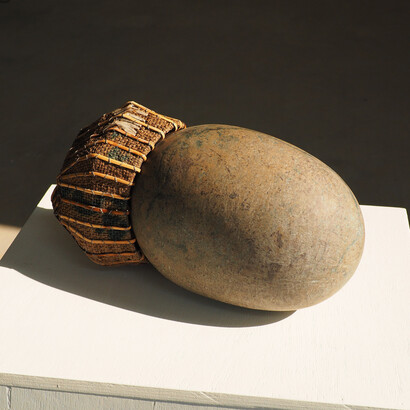 Sopheap Pich, Seed (Krognung No. 2). Stone, bamboo, rattan, burlap, plastic, metal wire, 42.5 x 18 x 20cm, 2015. Courtesy of the artist and Tyler Rollins Fine Art