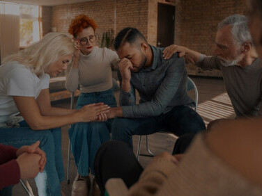 A group therapy meeting focused on building a supportive mental health network