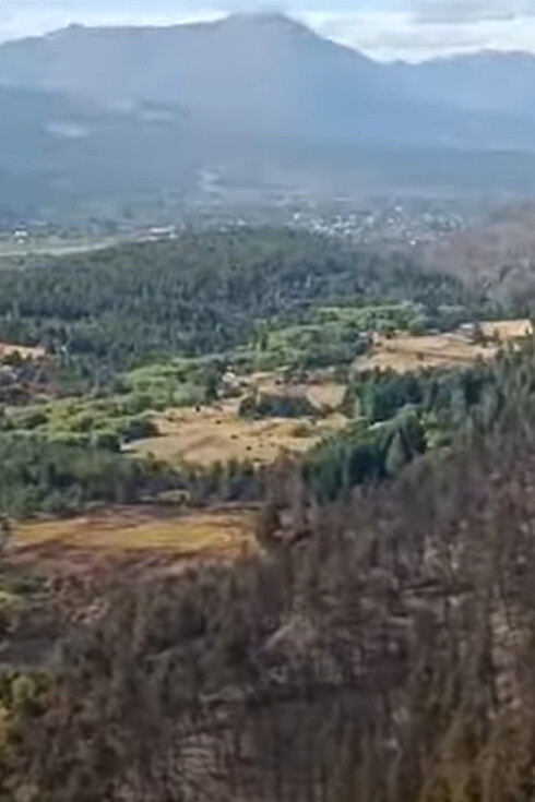 The extent of the damage from the February 2025 forest fires in El Bolson, Río Negro, Argentina, is seen from above